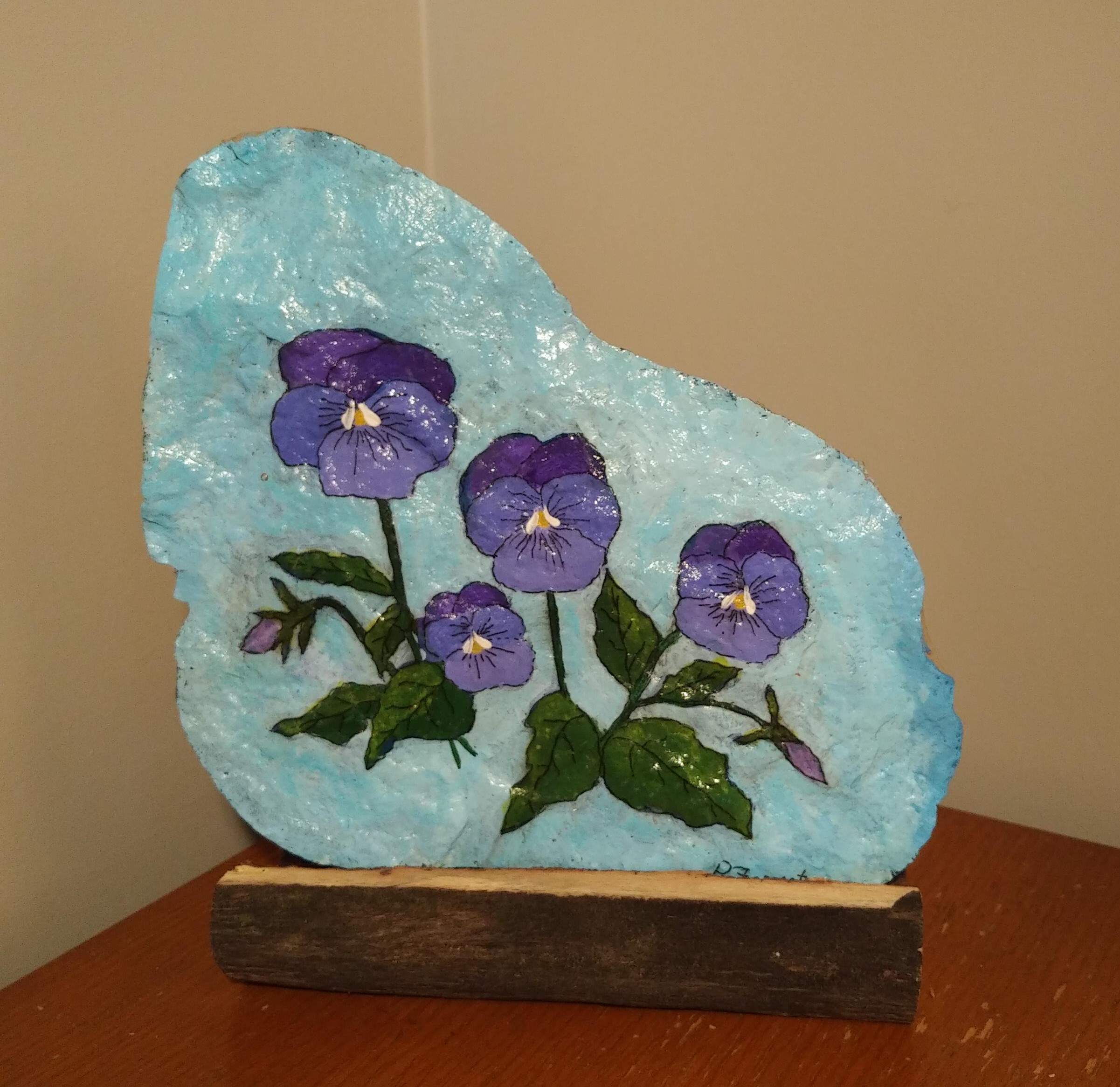 Purple Pansies on Blue Rock – $32